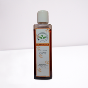 Natural Kumkumadi gray hair control oil bottle for reducing early greying and promoting healthy, dark, shiny hair